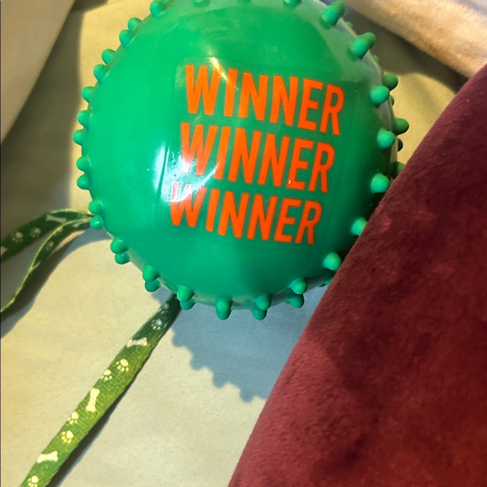 Green Winner Ball with Orange Text